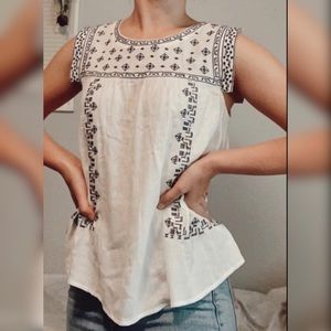 White and navy blouse